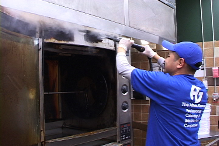 Commercial Kitchen Cleaning Service Oven Being Cleaned With Steam